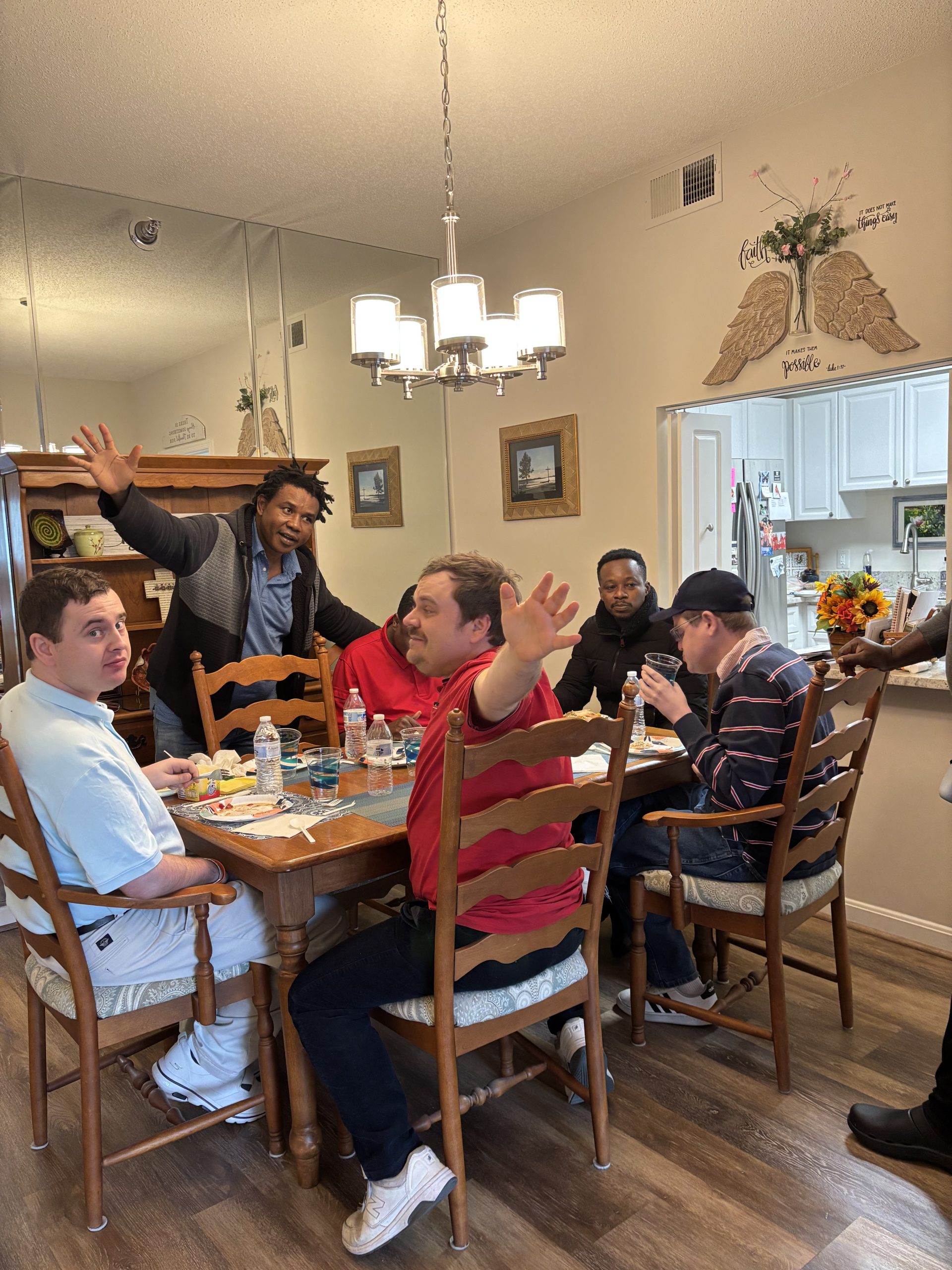 Alex with a cork board he made